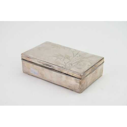 19 - A Silver engraved Cigarette Box, signed.