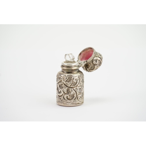 35 - A Victorian Silver Smelling Salts Bottle with inner glass stopper.