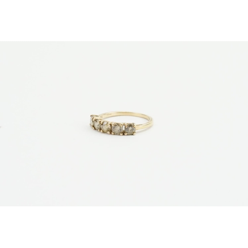 87 - A 9ct Gold and grey Diamond set ring, set with 5 grey Diamonds. Size approx 0.20ct. Weight approx 1.... 