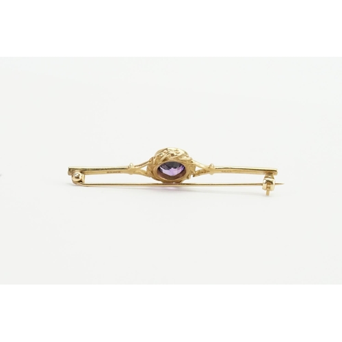 91 - A 9ct Gold and Amethyst Brooch, set with one oval Amethyst. Weight approx 3.8 grams. Size approx 1.8... 