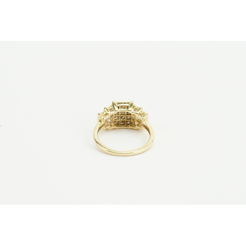 93 - A 9ct Gold and Diamond Ring, set with princess cut and round brilliant cut diamonds. Weight approx 2... 