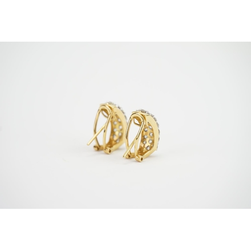 112 - A Pair of 18ct Gold Diamond Set Earrings in a 