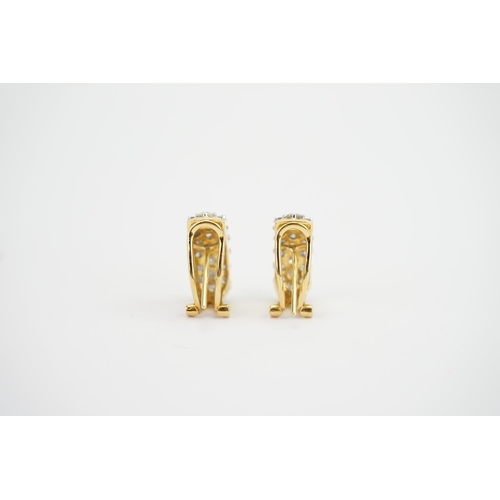 112 - A Pair of 18ct Gold Diamond Set Earrings in a 