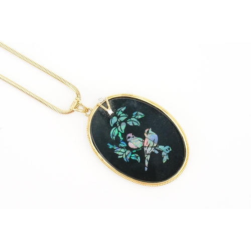 113 - A 9ct Gold Diamond & Onyx Set Pendant with Opal designed inlay of Birds in a tree on a 9ct Gold Chai... 