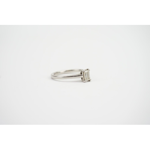 129 - A Ladies Princess Cut Diamond Platinum mounted Dress Ring.