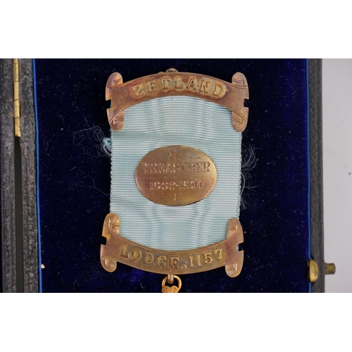 139 - A Masonic Freemasons Treasurer's medal for Lodge 1157, which is Zetland, awarded to Charles J. Cottr... 