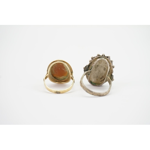 146 - A 9ct Gold Cameo Ring mounted with a young girl along with a stylised silver ring.