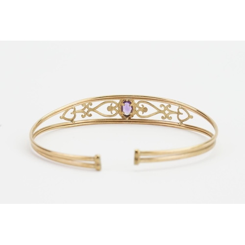 154 - A 9ct Gold Amethyst set bangle. Weight approximately 5.1g.