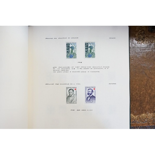 371 - A Private Collection of Seventeen stamp albums containing a collection of world stamps, to include I... 