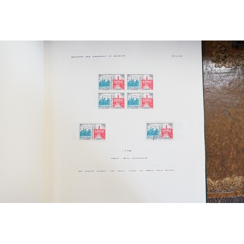 371 - A Private Collection of Seventeen stamp albums containing a collection of world stamps, to include I... 