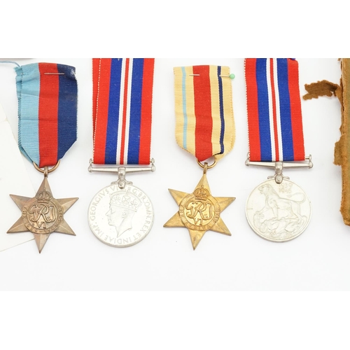 665 - WWII Medals to include 2 x Defence, 1939-1945 Star & an African Star.