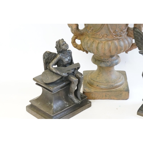 746 - A Pair of Resin Fairy Ornaments & a patinated Urn.