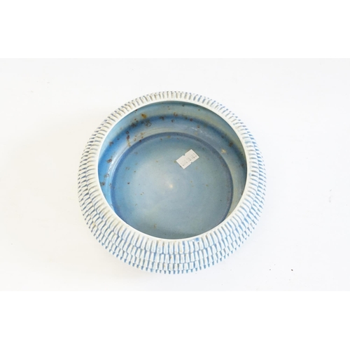 877 - A Clarice Cliff Bazaar Blue Glazed Dish.