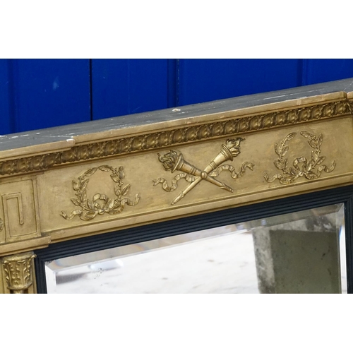 603 - A Georgian Gilt framed Three Panelled Bevelled Glass Over Mantle Mirror decorated with a frieze of T... 