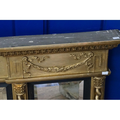 603 - A Georgian Gilt framed Three Panelled Bevelled Glass Over Mantle Mirror decorated with a frieze of T... 