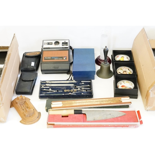 760 - A Cased Set of Drawing Instruments, a Slide Rule, collection of Paper Weights, three Cameras, Bell, ... 