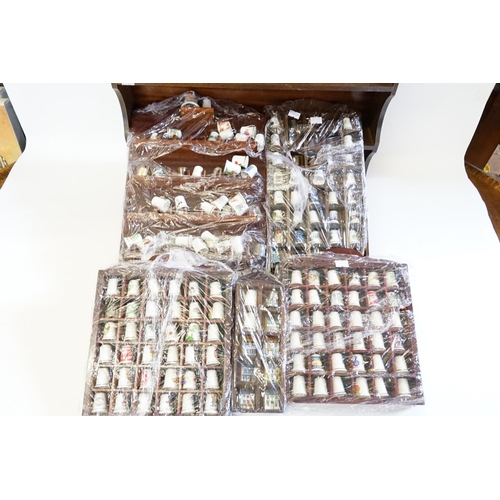 771 - A Large Collection of Thimbles in Wooden Cases.