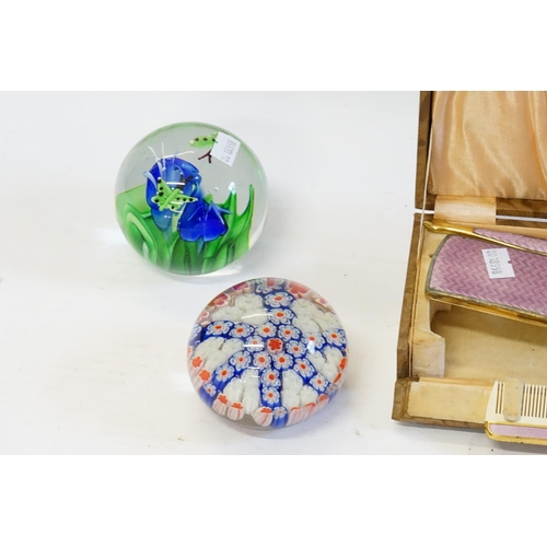 710 - A Modena design Glass Paper Weight, three others & a Gilt Metal three Piece Vanity Set in case.