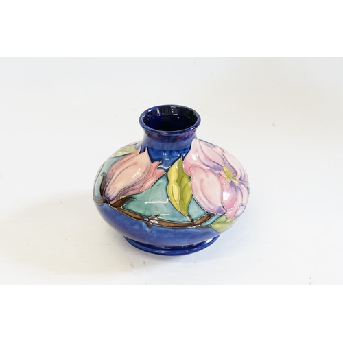 893 - A Squat Moorcroft Vase decorated with Anemones. Measuring: 12cms high.