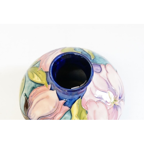 893 - A Squat Moorcroft Vase decorated with Anemones. Measuring: 12cms high.