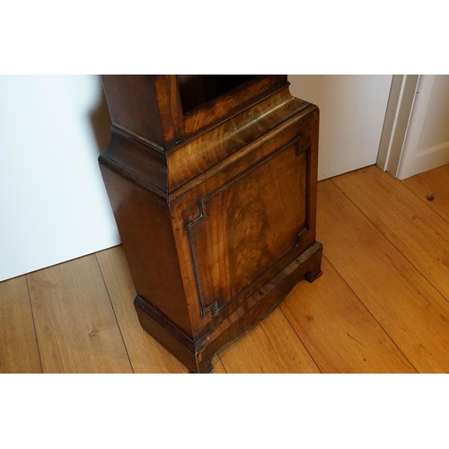 614 - A Victorian Cuban Flame Veneered Mahogany Long Case Clock fitted with a Nickel Silver Dial by 