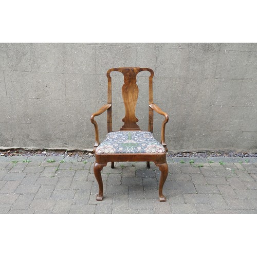 525 - A George I Walnut elbow chair with Shepherds Crook arms, circa 1720, from the NANTCLWYD Estate North... 