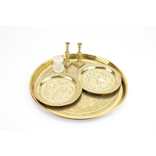 421A - A Collection of Indian brass trays and other items.