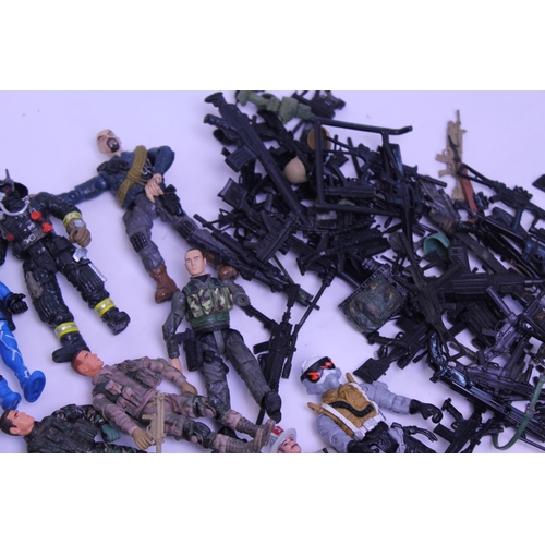 141 - A collection of various action figures to include a large amount of weapons and accessories.