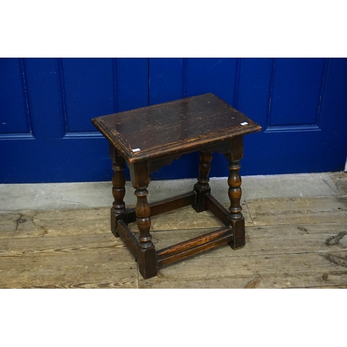 592 - A Reproduction Oak Joint Stool on Bulbous Legs and Stretchers. Measuring: 46cms across x 31cms deep ... 