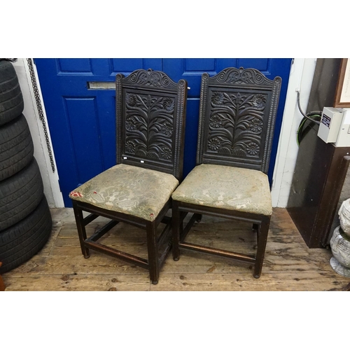 596 - A Pair of Victorian carved oak, North Yorkshire, solid Panelled carved back, Cromwellian design dini... 