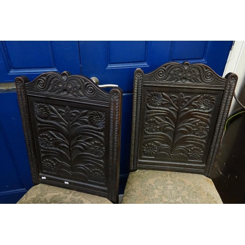 596 - A Pair of Victorian carved oak, North Yorkshire, solid Panelled carved back, Cromwellian design dini... 