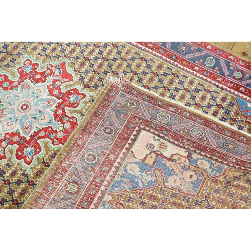 286 - A Large Red, Blue & Cream Rug. Measuring: 300cms x 165cms.