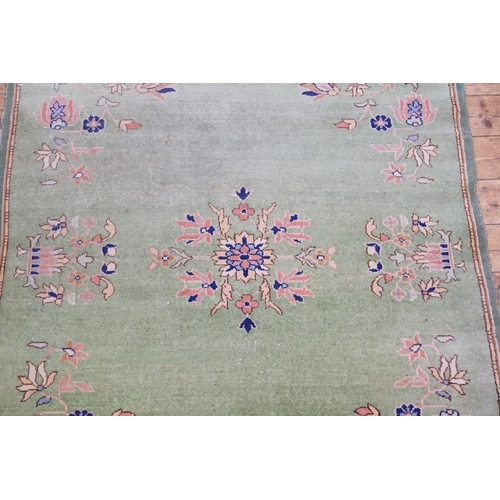 288 - An All-Over Green Rug. Measuring: 156cms x 246cms.