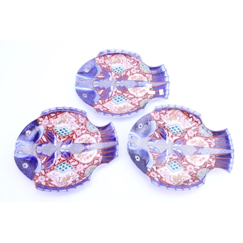 407 - A Set of Three Imari Rust Blue & Gilt Fish decorated Serving Plates. Measuring: 28cms x 24cms.