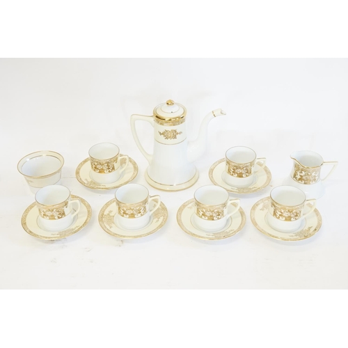 948 - A Japanese Gilt Floral bordered coffee set marked 