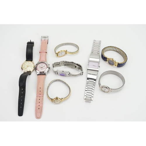 258 - A collection of ladies watches.