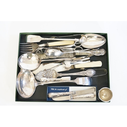 83 - A Tray of Silver Plated items to include a Soup ladle, Tongs, Fish Servers, etc.