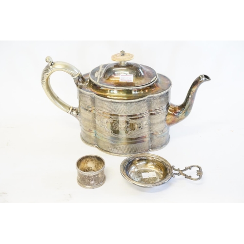 85 - A Victorian Silver Plated Tea Pot with wicker decoration, a Silver Napkin Ring and a Tea Strainer.