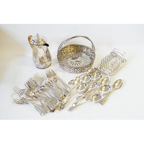 101 - A Silver Plated Wicker Wooven Basket, a Toast Rack, a Hot Water Jug and various other Silver Plate.