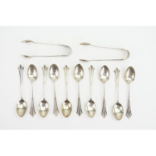 38 - Albany Patterned Silver Tea Spoons & Two Pairs of Sugar Tongs. Weighing: 161 grams.