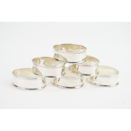 57 - A Set of Oval Silver Napkin Rings, marked 925. Weighing: 121gms.