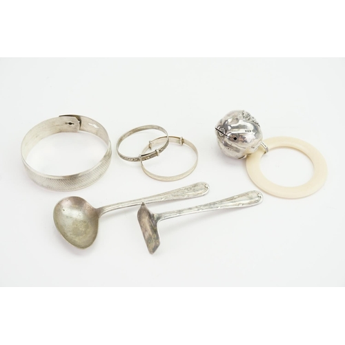 61 - A Silver Bangle, Pushers, Apple Teething Ring, etc.