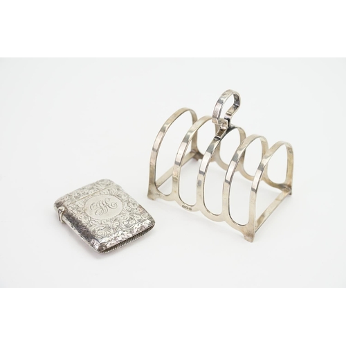 64 - A Victorian engraved Silver Vesta Case & a Silver Toast Rack. Weighing 70 grams.