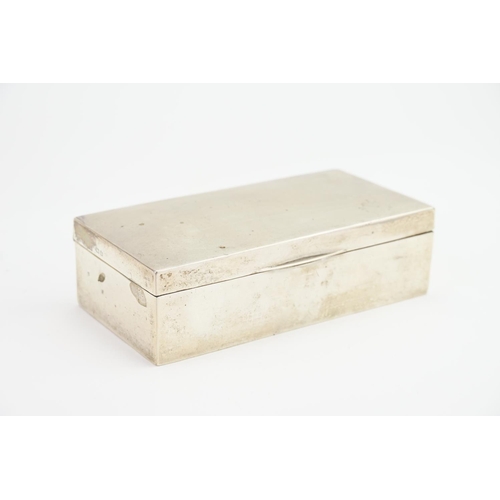 75 - A Silver mounted and teak lined Cigarette box.