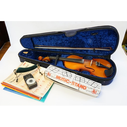 329 - A Modern Violin with an ebony board along with music stand, sheets & Case.