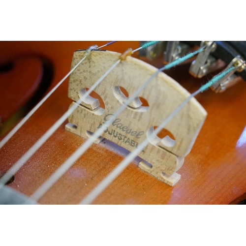 329 - A Modern Violin with an ebony board along with music stand, sheets & Case.