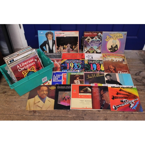 334 - A Collection of records to include Seekers, Tony Hancock, Liberace, ABBA, Madonna, etc.