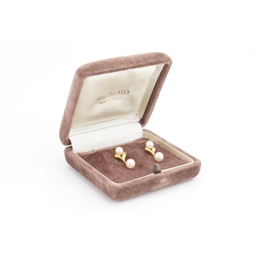 118 - A Pair of 14ct Gold Drop Pearl Earrings. Weighing: 3.4 Grams.