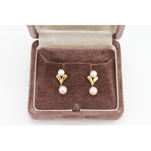 118 - A Pair of 14ct Gold Drop Pearl Earrings. Weighing: 3.4 Grams.