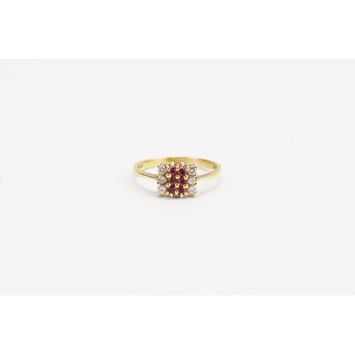 124 - An 18ct Gold Ruby & Diamond Square Cluster Ring. Weighing: 3.3 grams.